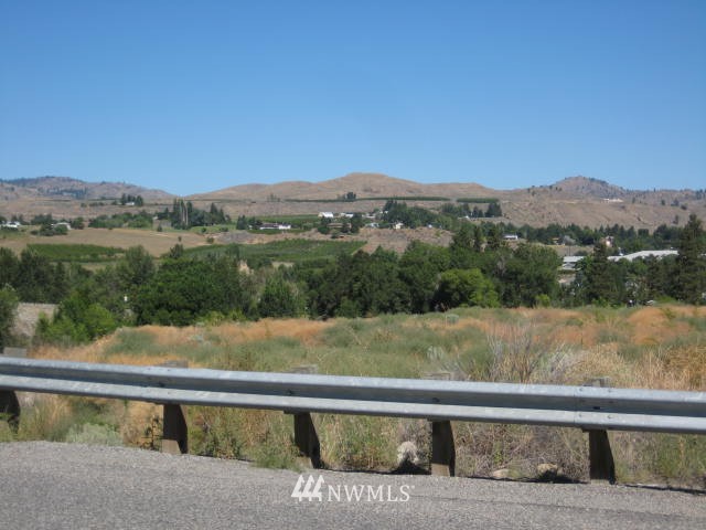 0 Apple Way Road Okanogan, WA 98840 - Photo 2 of 10 a view of a lake with a mountain in the background