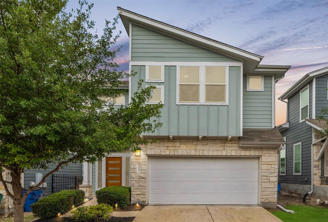 2313 Capulet Street Austin, TX 78741 - Photo 1 of 1 a front view of a house with garage