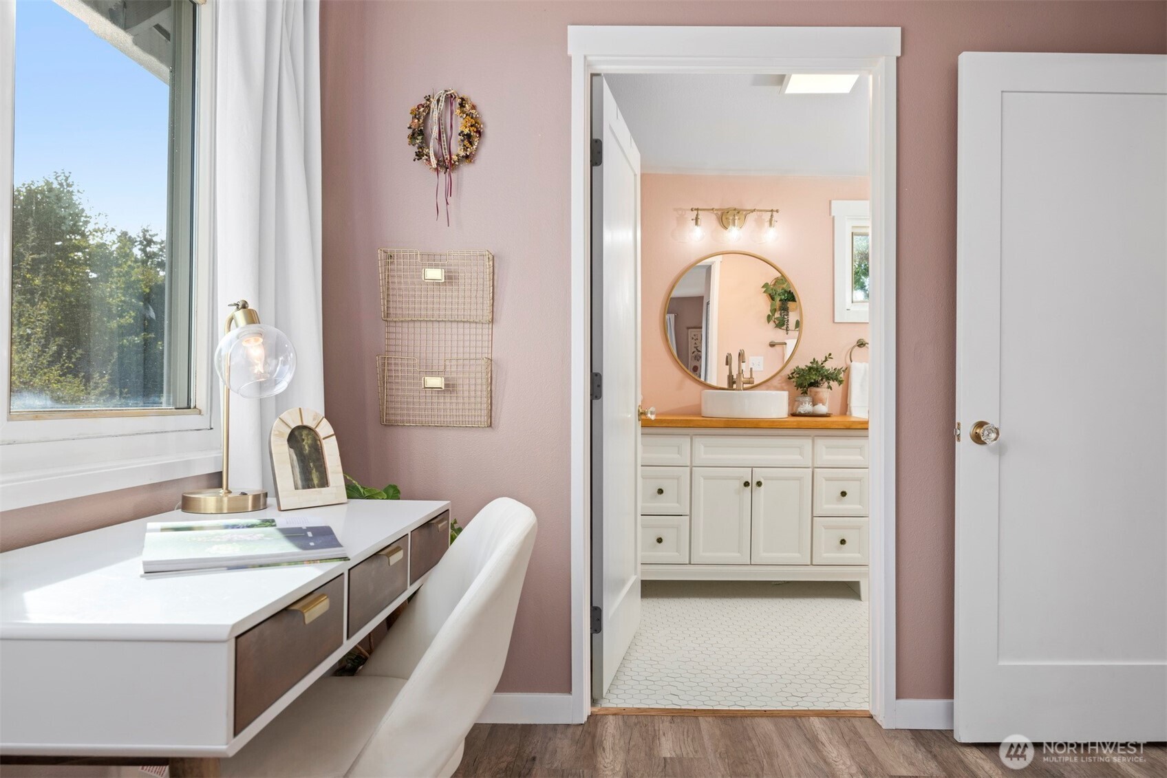 3895 Bancroft Road Bellingham, WA 98225 - Photo 11 of 40 a spacious bathroom with a double vanity sink and a mirror