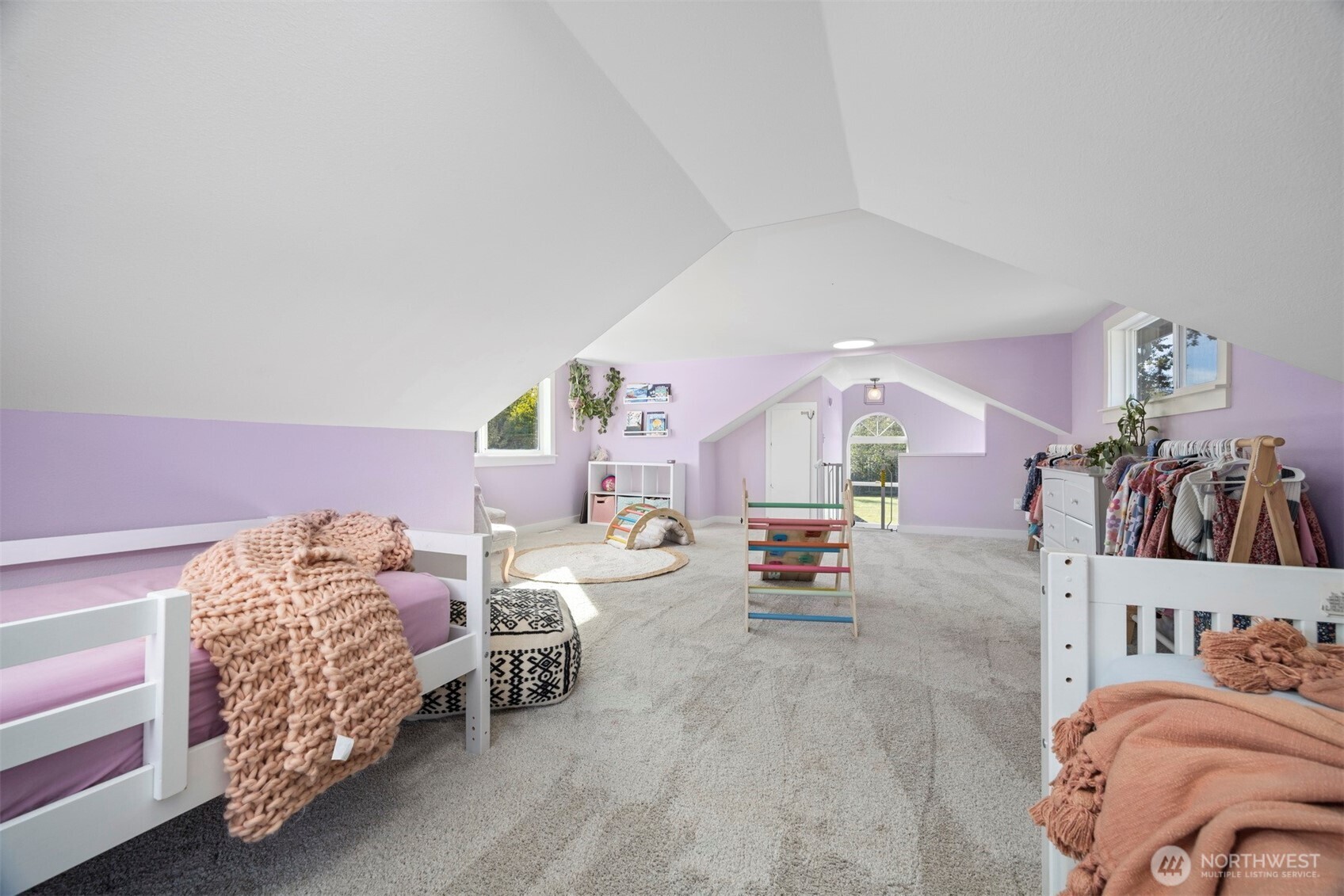 3895 Bancroft Road Bellingham, WA 98225 - Photo 18 of 40 a bedroom with furniture and a couch