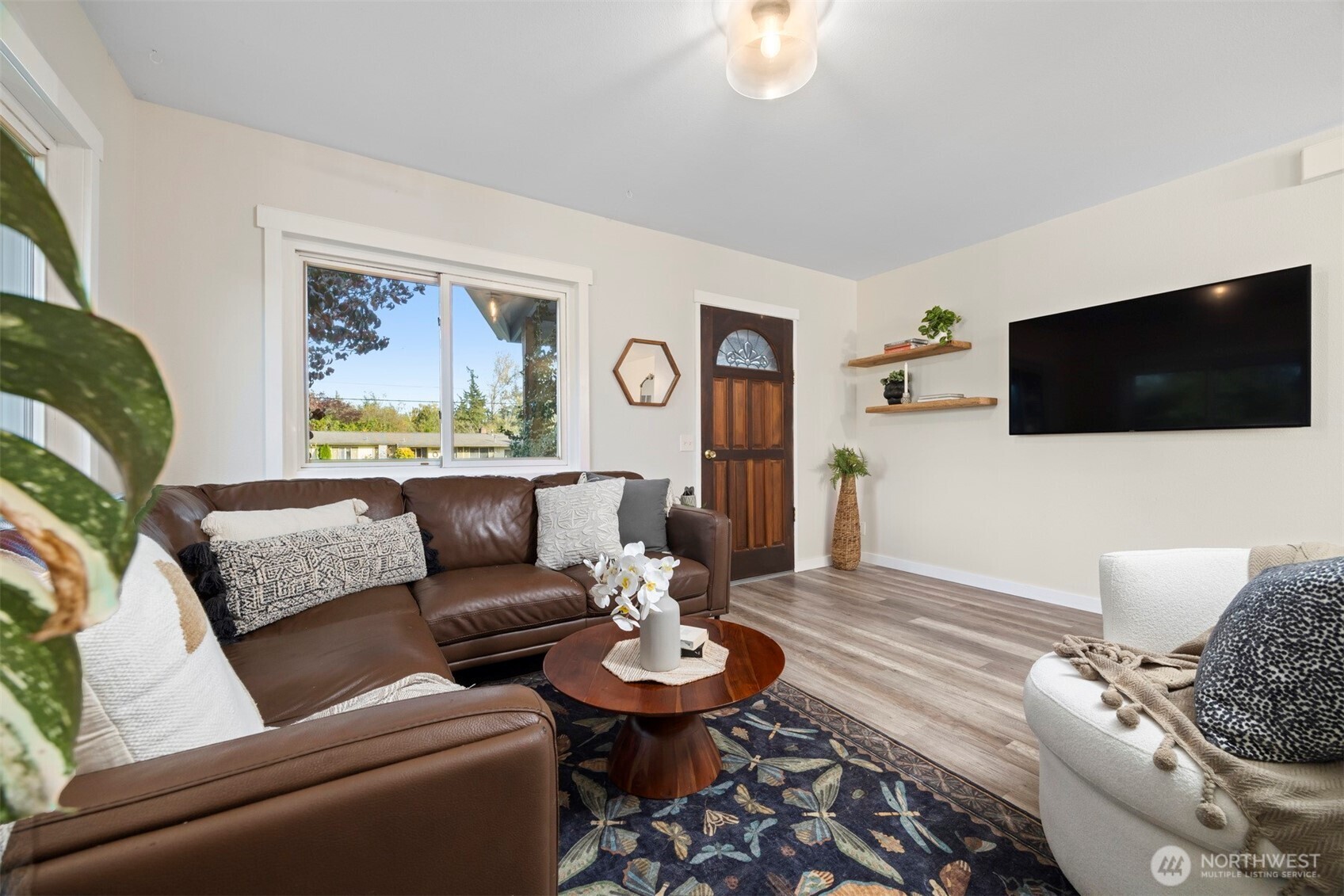 3895 Bancroft Road Bellingham, WA 98225 - Photo 3 of 40 a living room with furniture and a flat screen tv