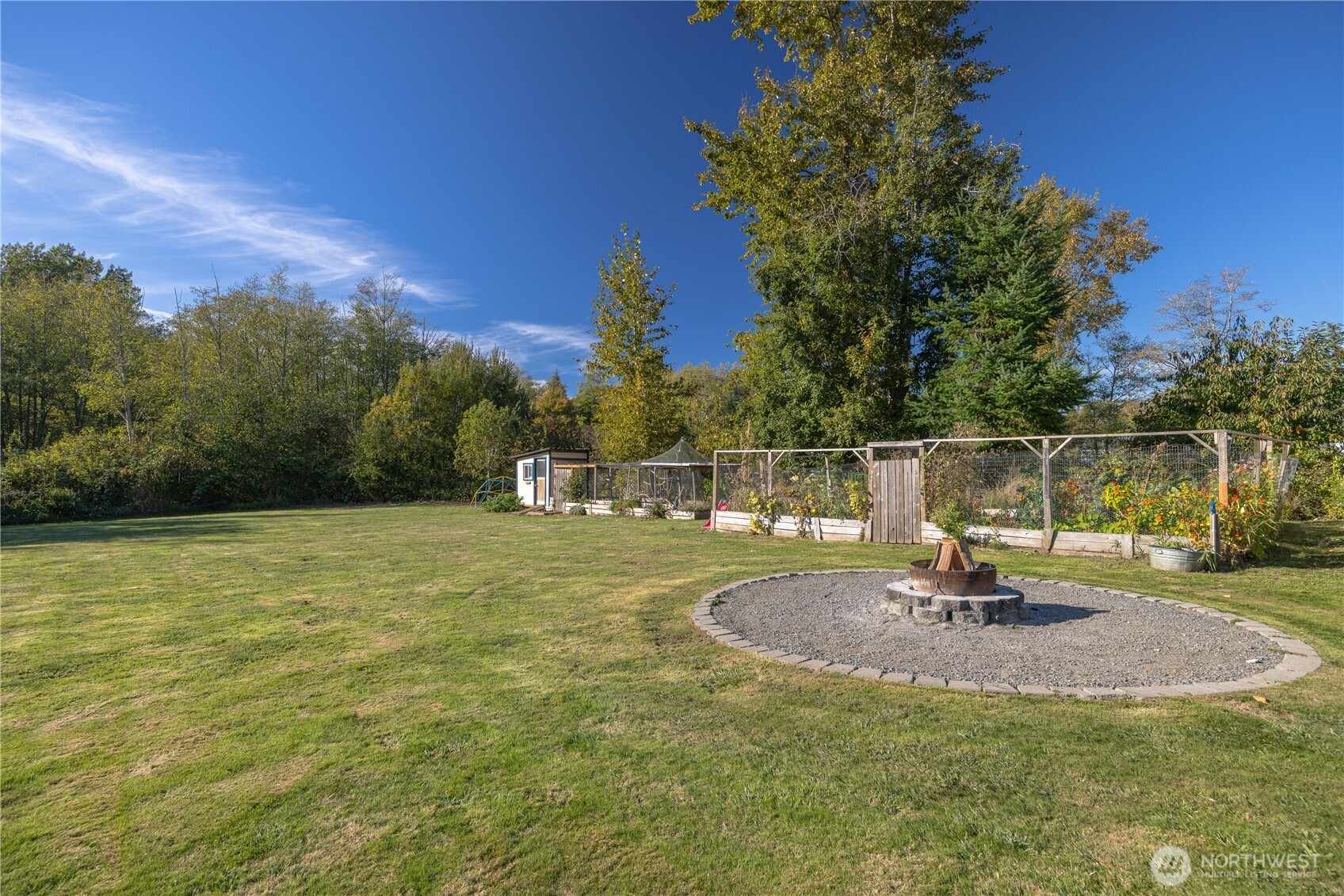 3895 Bancroft Road Bellingham, WA 98225 - Photo 35 of 40 a swimming pool with trees in the background