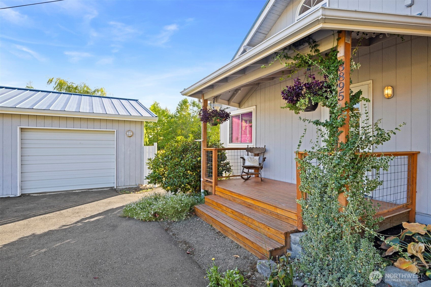 3895 Bancroft Road Bellingham, WA 98225 - Photo 40 of 40 a front view of a house with a garden
