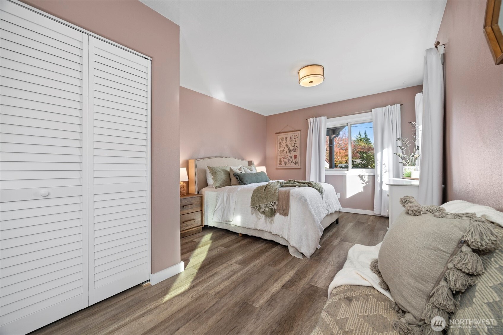 3895 Bancroft Road Bellingham, WA 98225 - Photo 10 of 40 a bedroom with a bed and a window