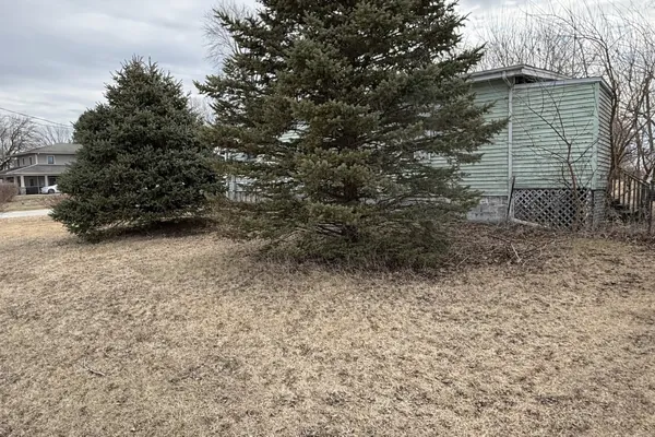 a view of backyard with green space