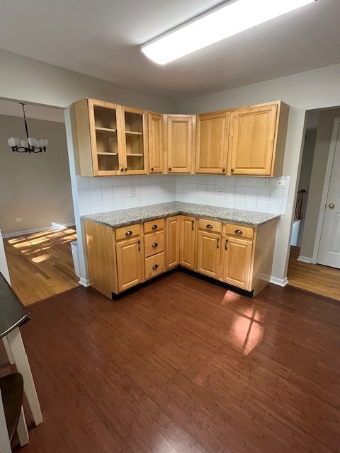2705 Dana Avenue Waukegan, IL 60087 - Photo 7 of 21 a kitchen with stainless steel appliances granite countertop a sink and a stove