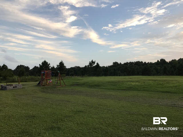 8321 Roy Waters Road Foley, AL 36535 - Photo 4 of 15 backyard of property