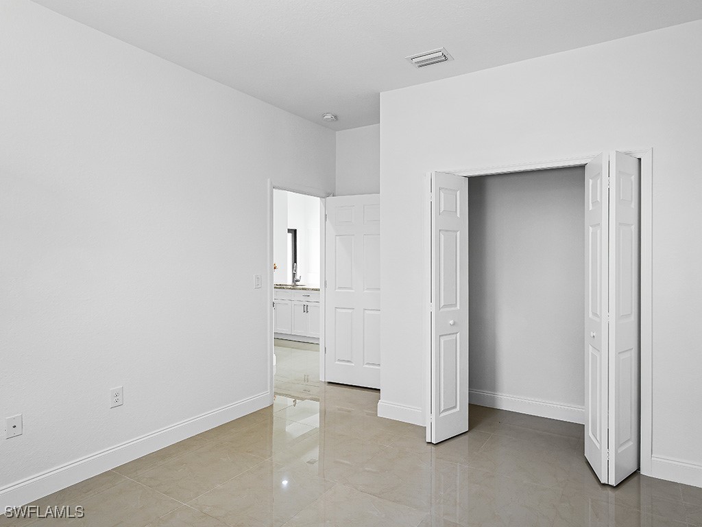 902 Williams Avenue Lehigh Acres, FL 33972 - Photo 17 of 30 a view of empty room