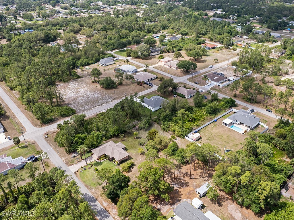 902 Williams Avenue Lehigh Acres, FL 33972 - Photo 21 of 30 an aerial view of residential house with outdoor space