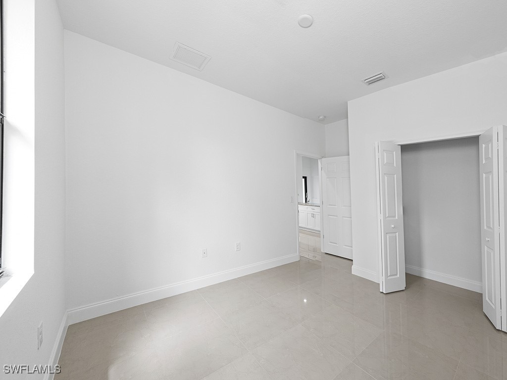902 Williams Avenue Lehigh Acres, FL 33972 - Photo 30 of 30 a view of an empty room