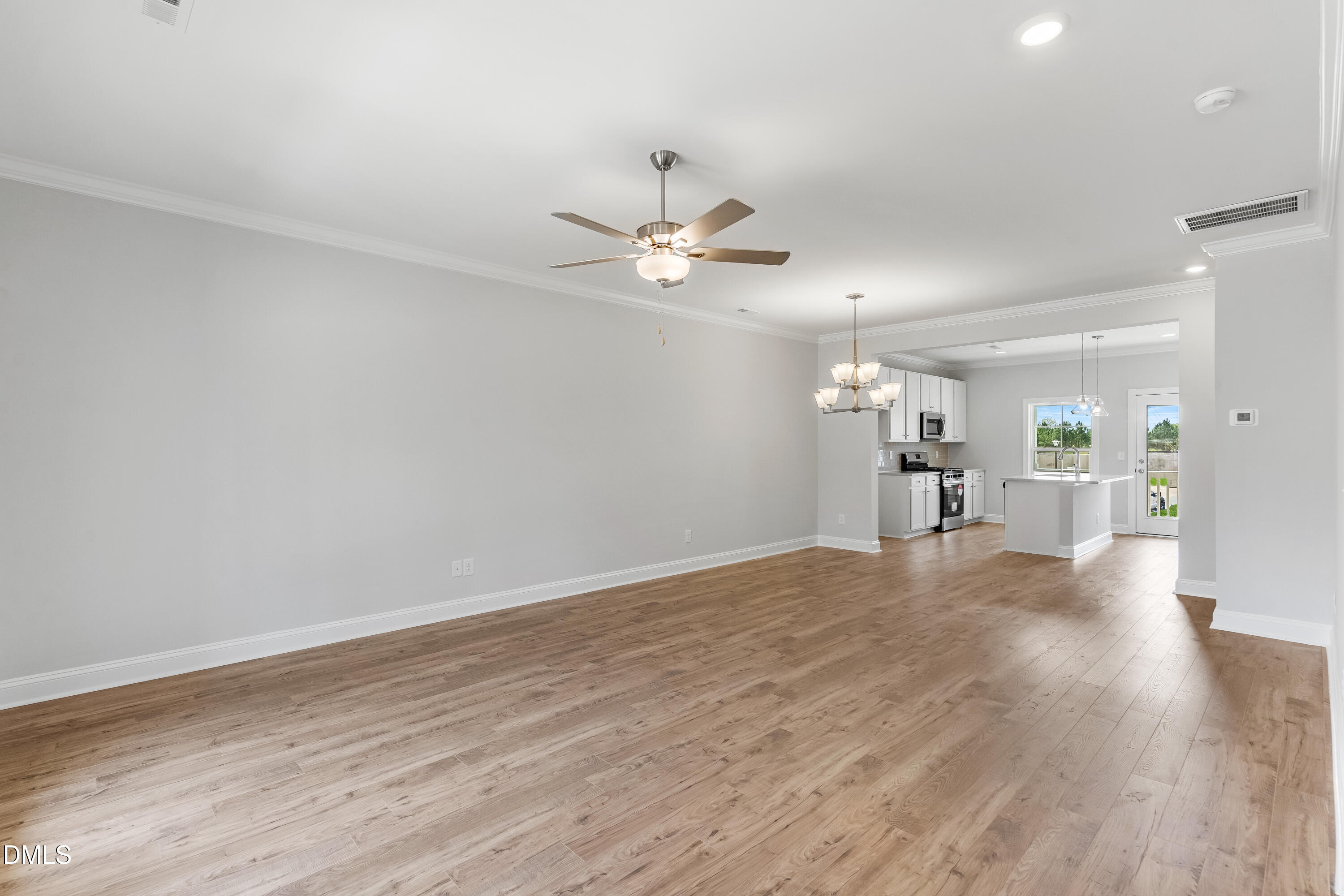519 Forestville Road Wake Forest, NC 27587 - Photo 16 of 38 a view of a livingroom with a hardwood floor