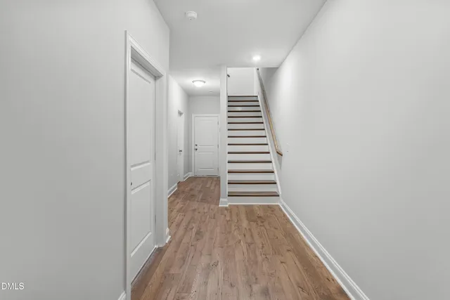a view of entryway with wooden floor