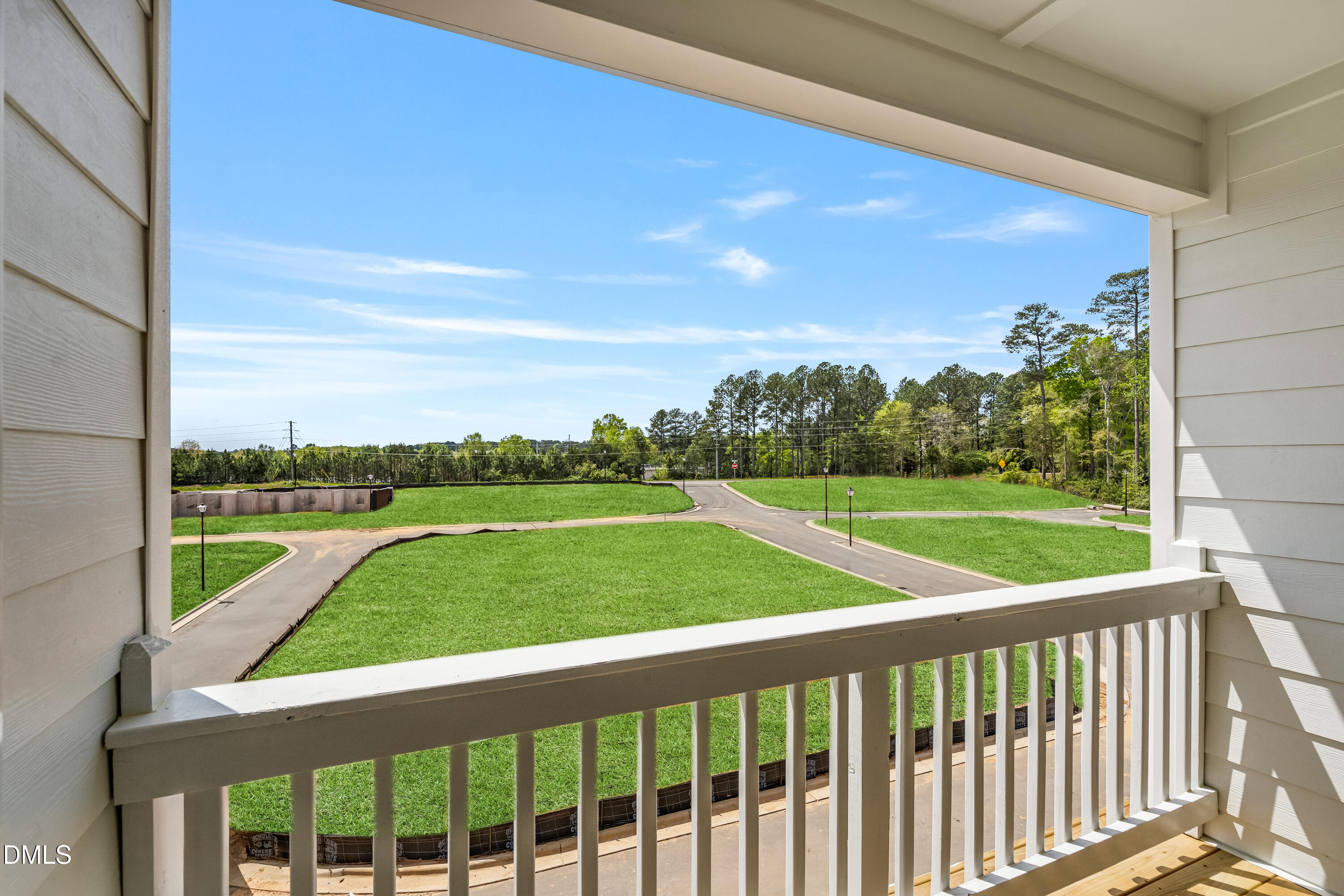 519 Forestville Road Wake Forest, NC 27587 - Photo 31 of 38 a view of a green field with sitting space