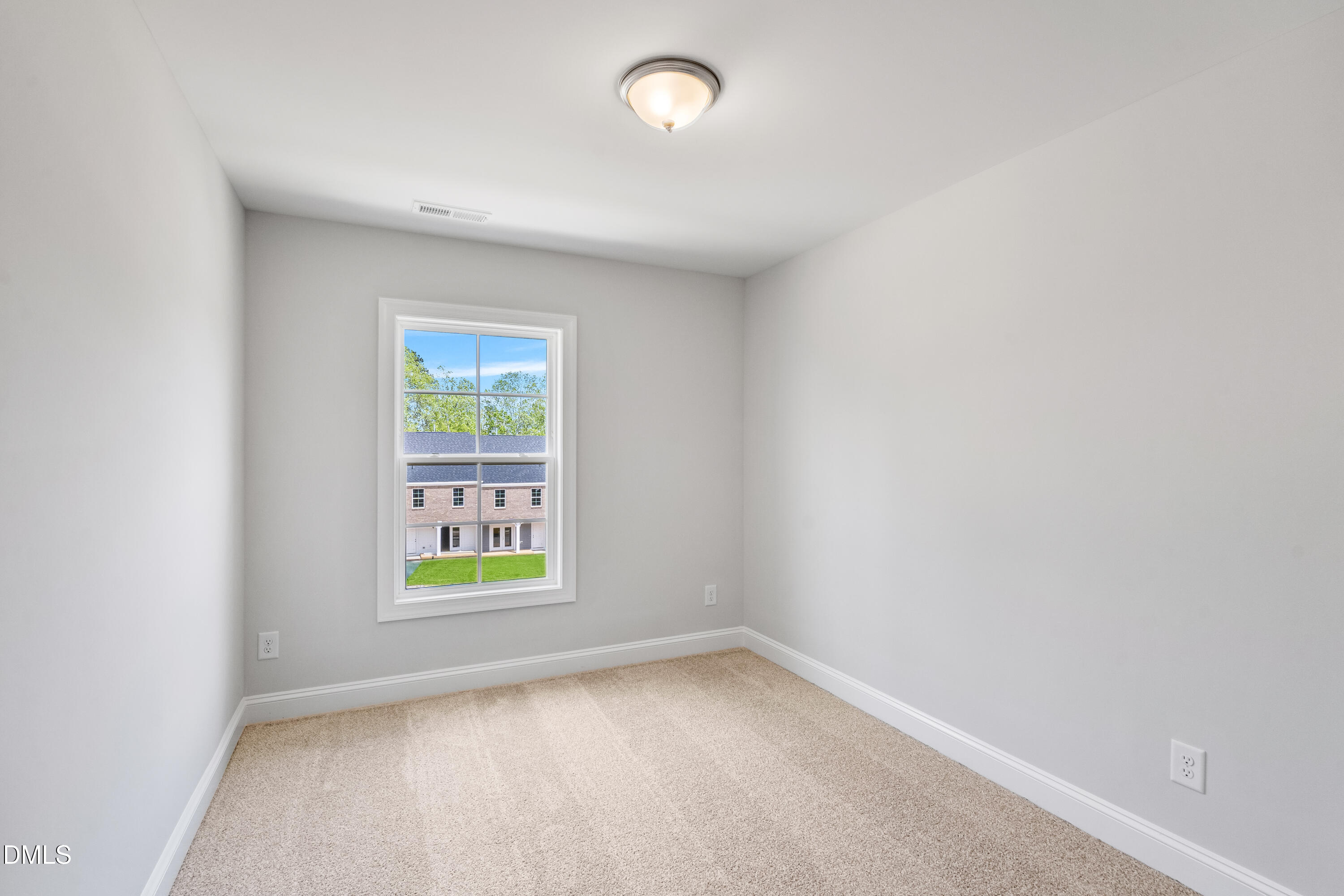 519 Forestville Road Wake Forest, NC 27587 - Photo 35 of 38 an empty room with windows