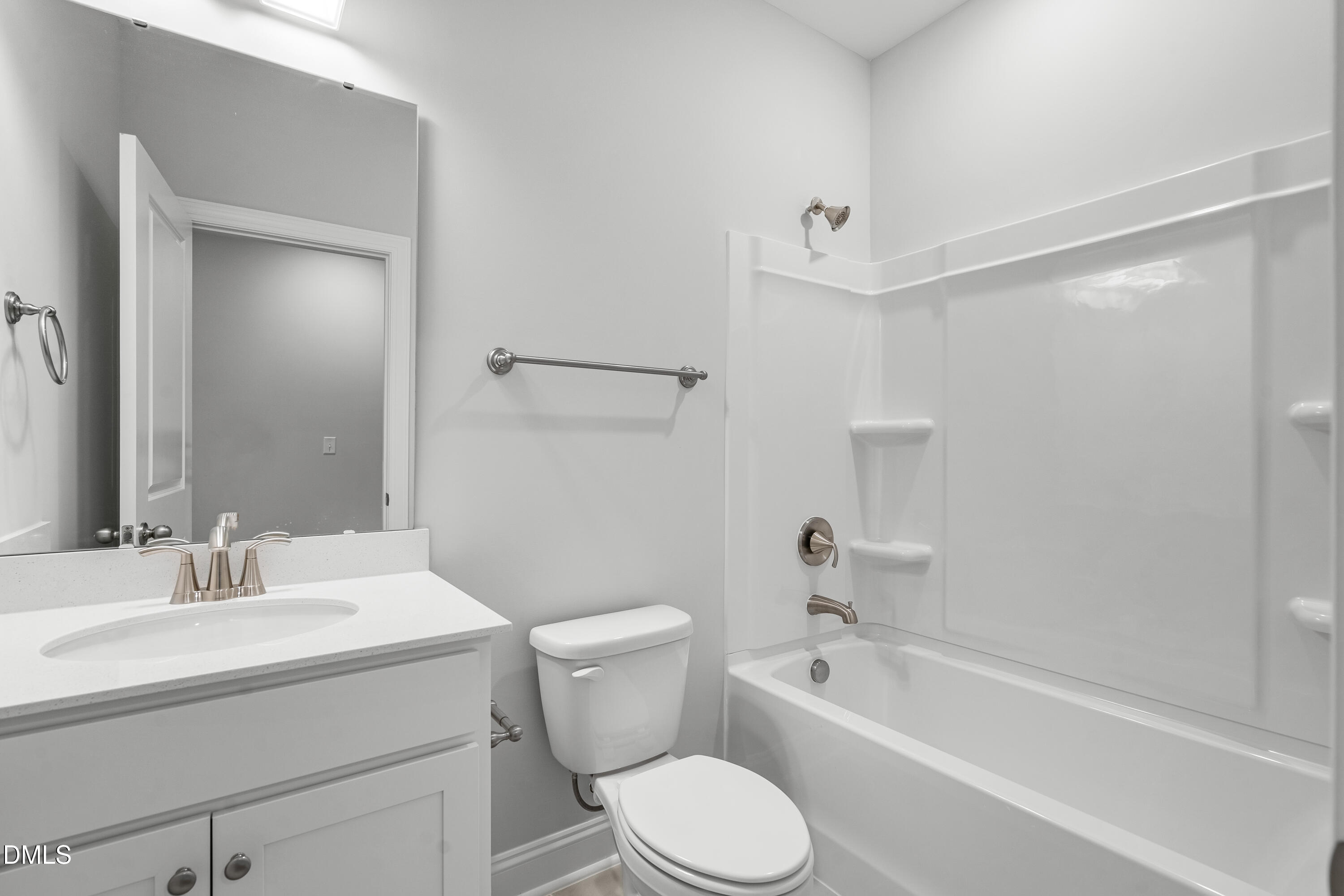 519 Forestville Road Wake Forest, NC 27587 - Photo 5 of 38 a bathroom with a sink toilet and bathtub