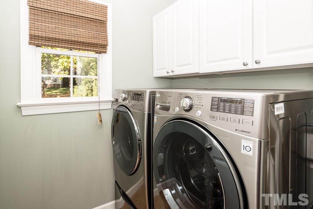 5020 Big Creek Road Raleigh, NC 27613 - Photo 20 of 25 a utility room with dryer and washer