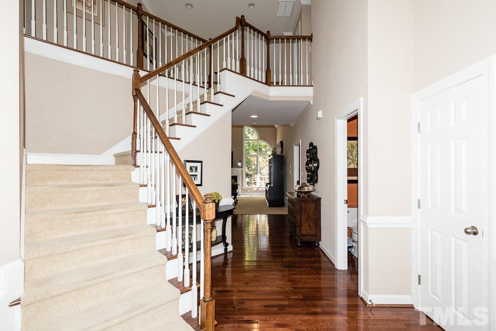 5020 Big Creek Road Raleigh, NC 27613 - Photo 3 of 25 a view of entryway and hall with wooden floor