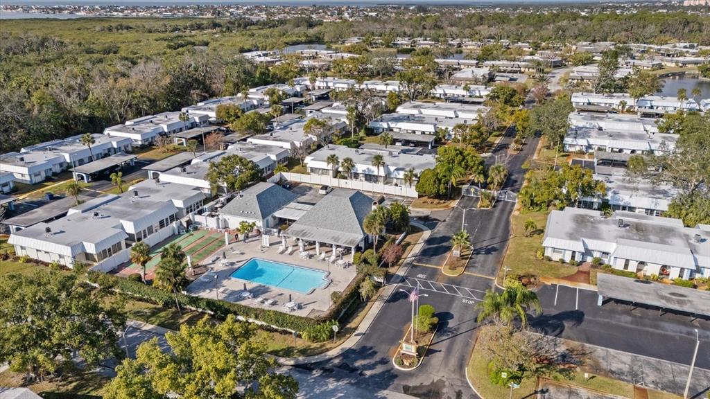 4231 Richmere Drive, Unit 3D New Port Richey, FL 34652 - Photo 30 of 31 an aerial view of a city with lots of residential buildings