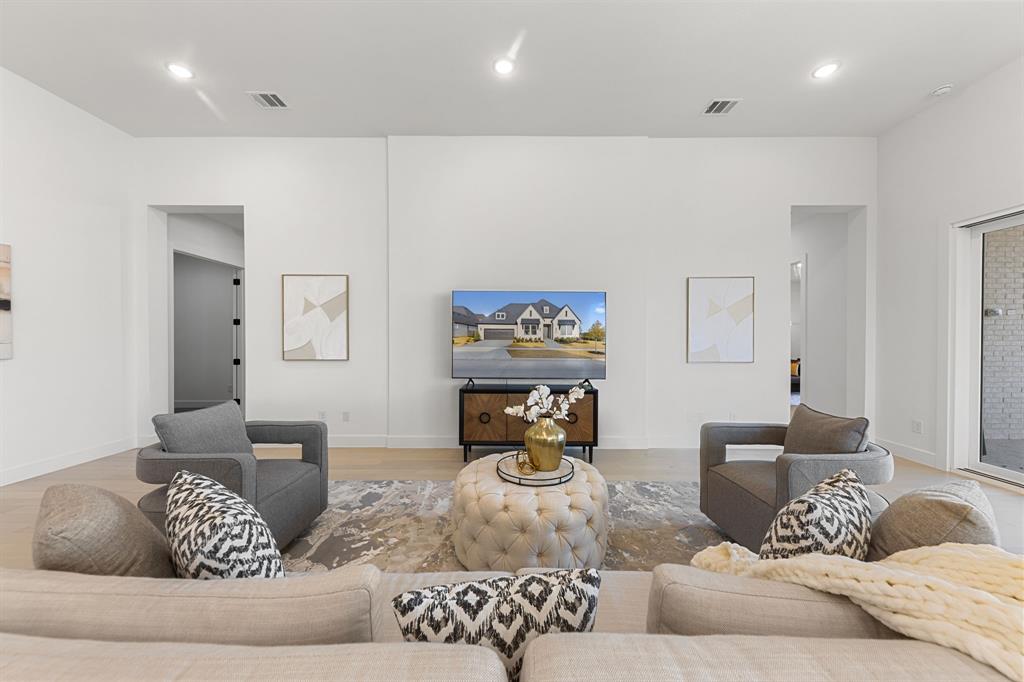 270 Peach Pt Road Prosper, TX 75078 - Photo 11 of 40 a living room with furniture and a couch