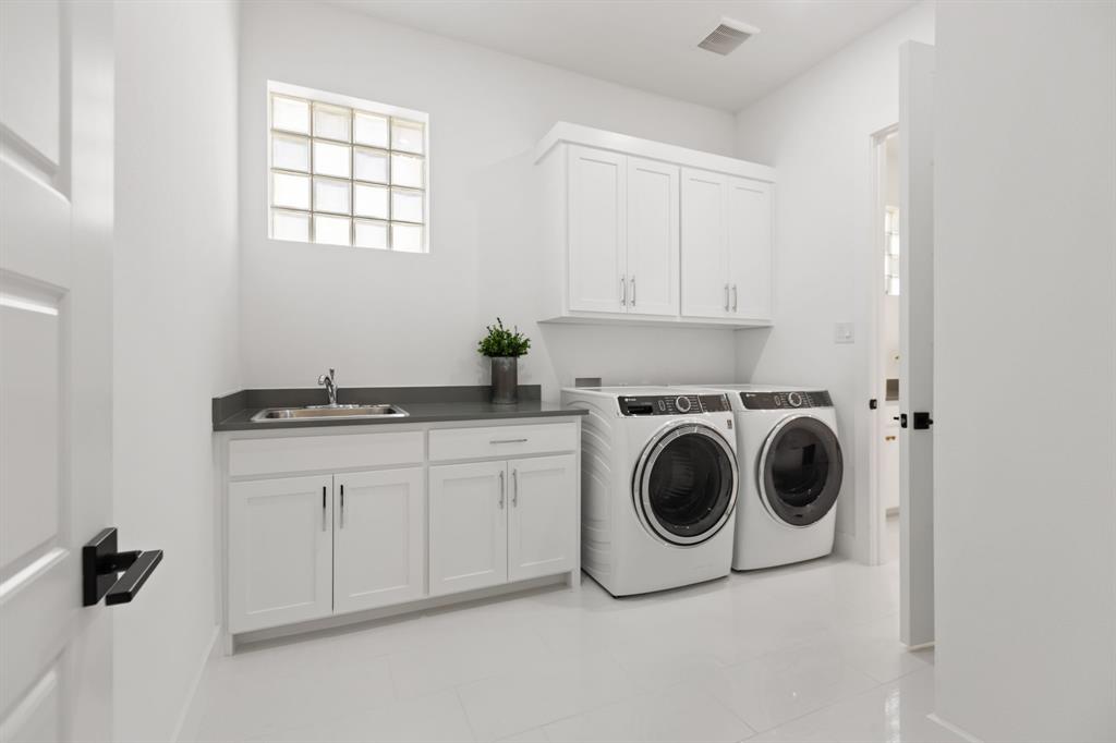 270 Peach Pt Road Prosper, TX 75078 - Photo 18 of 40 a utility room with sink dryer and washer