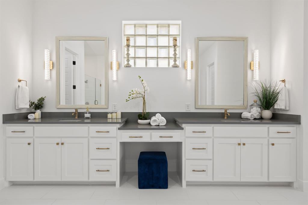 270 Peach Pt Road Prosper, TX 75078 - Photo 23 of 40 a bathroom with white cabinets and a sink