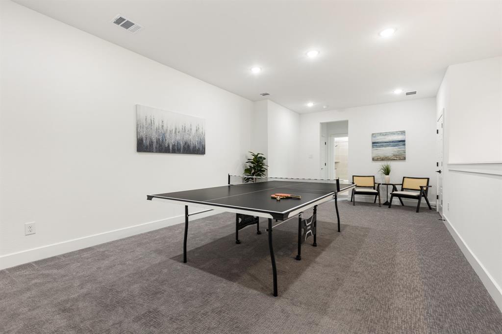 270 Peach Pt Road Prosper, TX 75078 - Photo 30 of 40 a view of a livingroom with furniture and a table