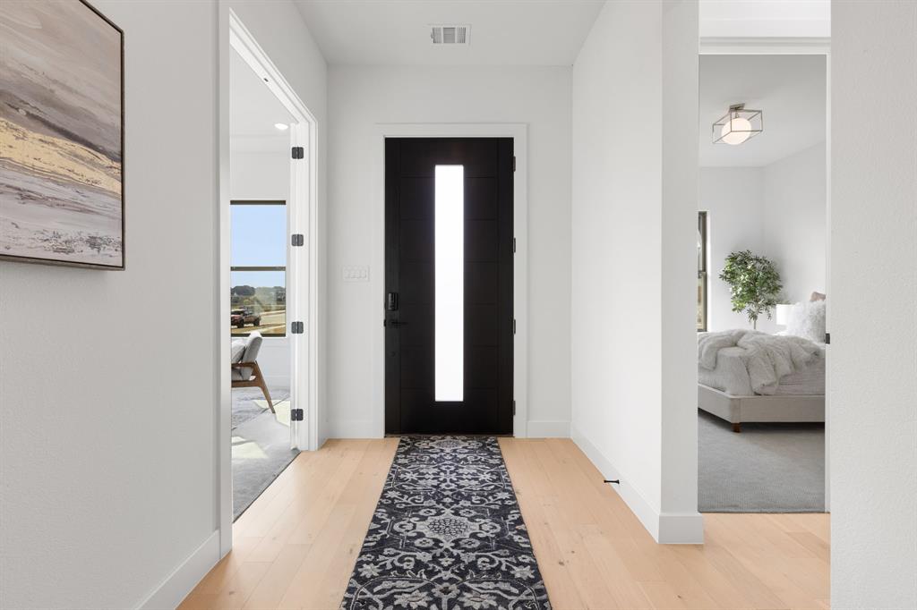 270 Peach Pt Road Prosper, TX 75078 - Photo 5 of 40 a bedroom with a bed and a window