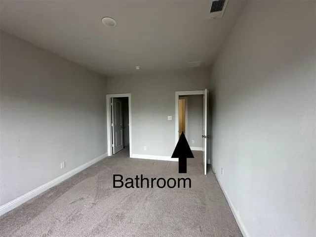 a view of a room with windows