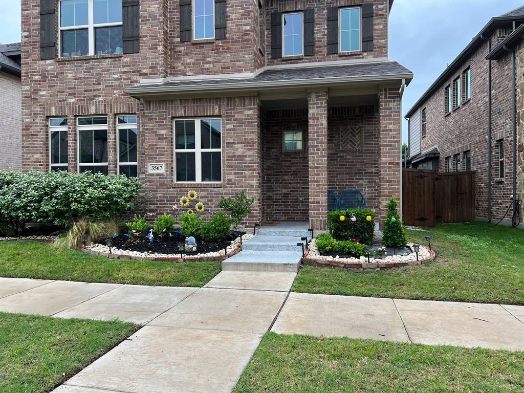 3567 Sevilla Drive Frisco, TX 75034 - Photo 2 of 27 a front view of a house with a garden