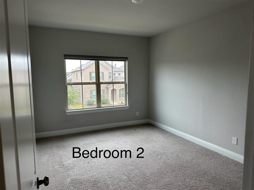 3567 Sevilla Drive Frisco, TX 75034 - Photo 22 of 27 an empty room with a window