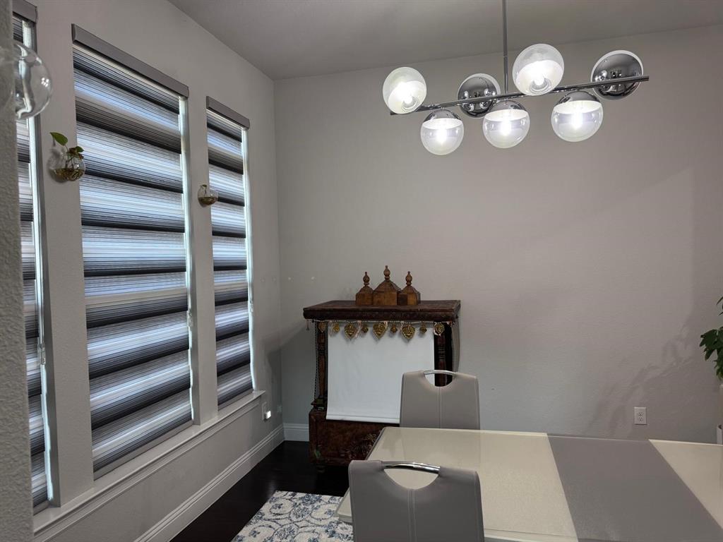 3567 Sevilla Drive Frisco, TX 75034 - Photo 9 of 27 a room with furniture and wooden floor