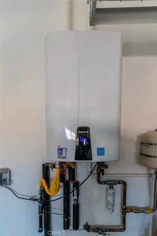 a table with chairs and wooden floor