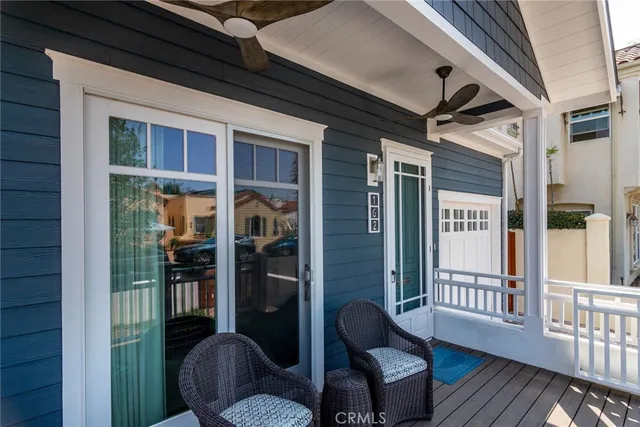 a view of an chairs and table in the balcony