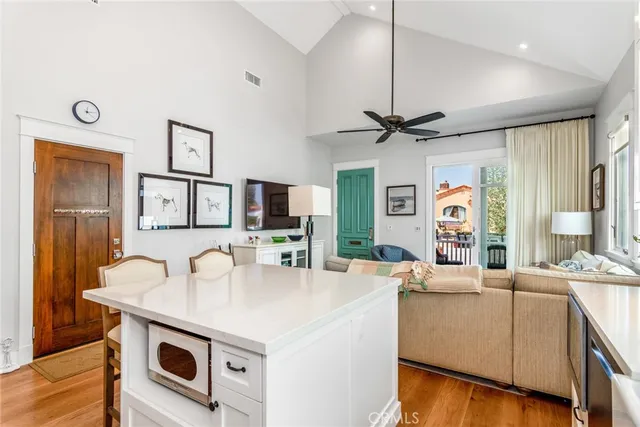 a kitchen with stainless steel appliances a sink a stove and a refrigerator