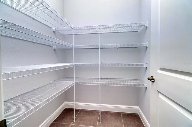a view of a house with yard and front view of a house