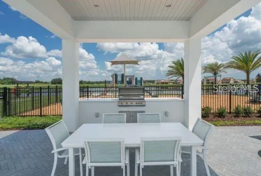 a view of a patio with swimming pool