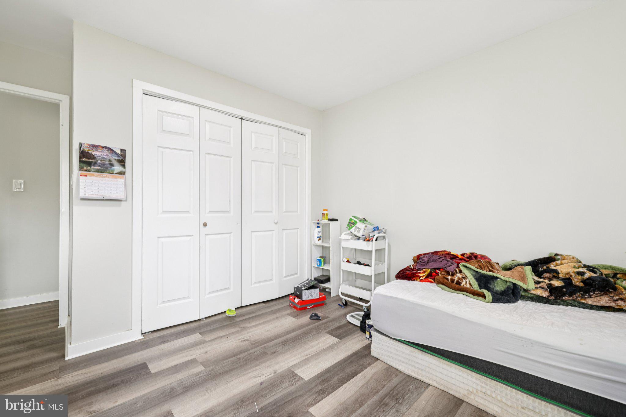 7969 Riggs Road, Unit 9 Hyattsville, MD 20783 - Photo 13 of 30 a bedroom with a bed and a window