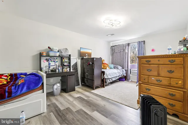 a bathroom with a sink a mirror and a toilet