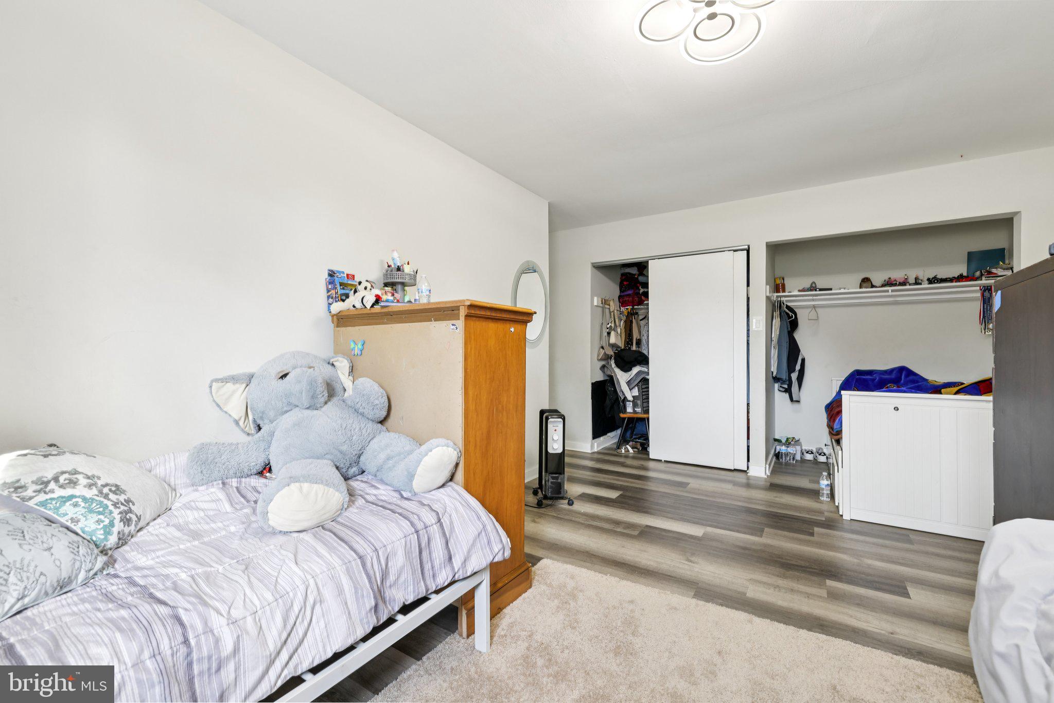 7969 Riggs Road, Unit 9 Hyattsville, MD 20783 - Photo 16 of 30 a bedroom with a bed and a window