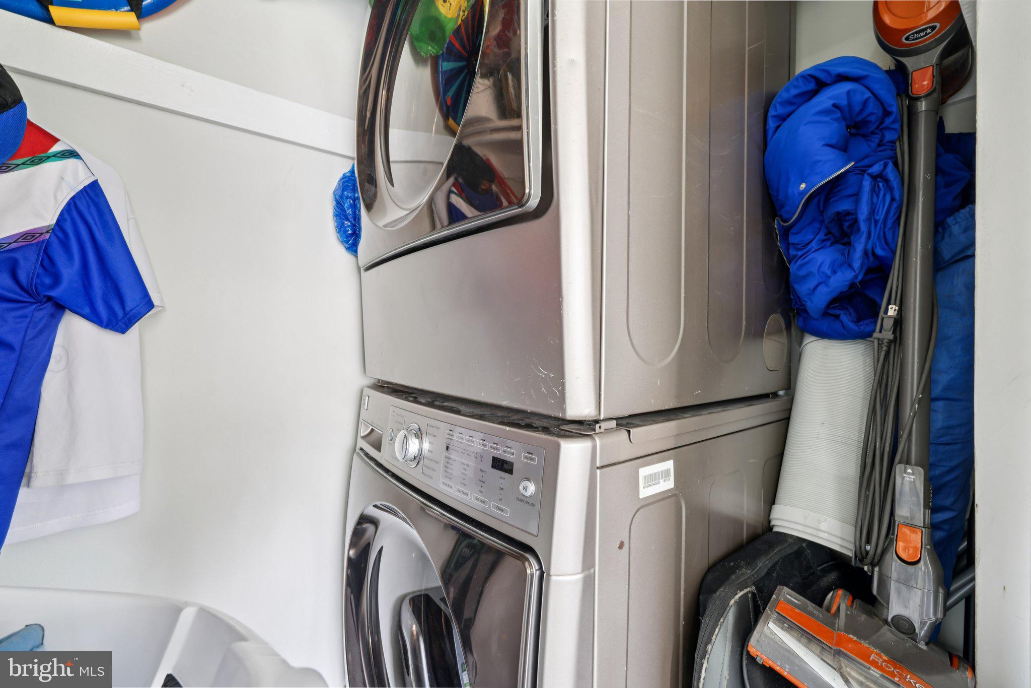 7969 Riggs Road, Unit 9 Hyattsville, MD 20783 - Photo 19 of 30 a utility room with dryer and washer