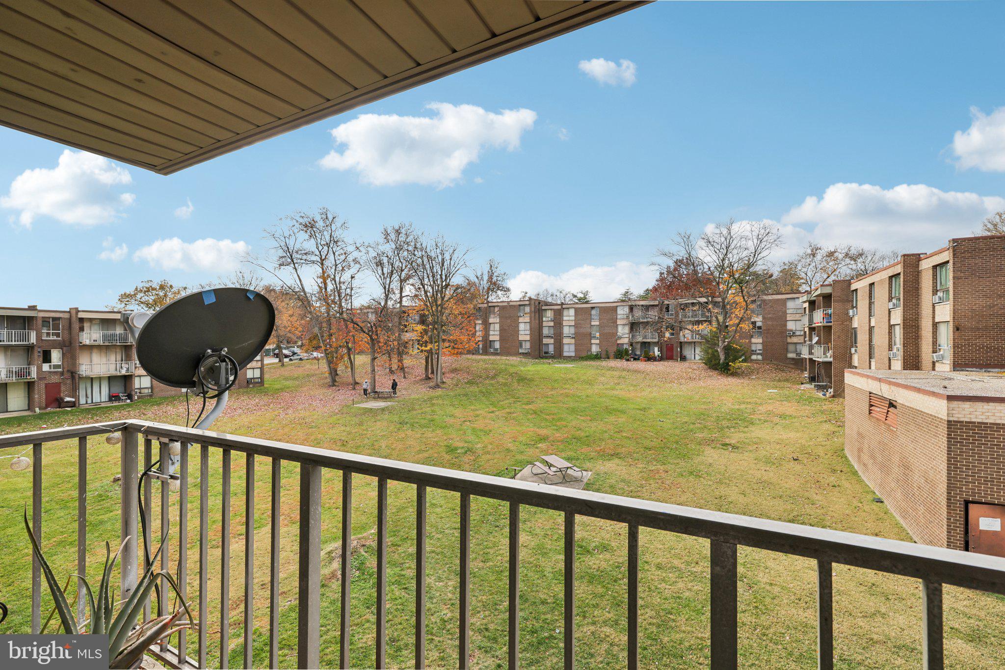 7969 Riggs Road, Unit 9 Hyattsville, MD 20783 - Photo 20 of 30 a view of a swimming pool from a balcony