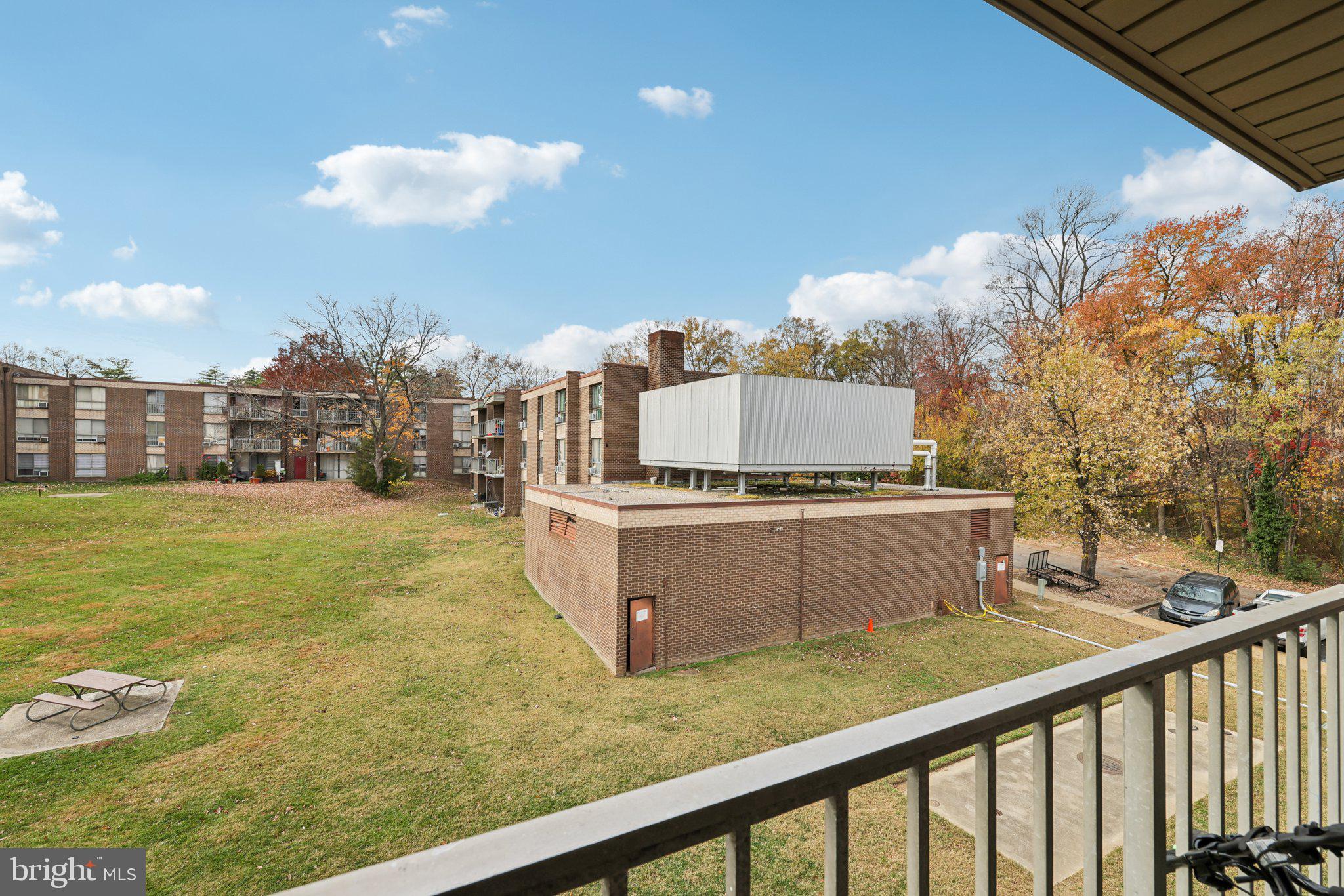 7969 Riggs Road, Unit 9 Hyattsville, MD 20783 - Photo 21 of 30 a view of a balcony with trees