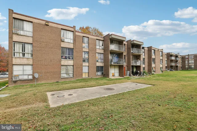 a view of a balcony with trees