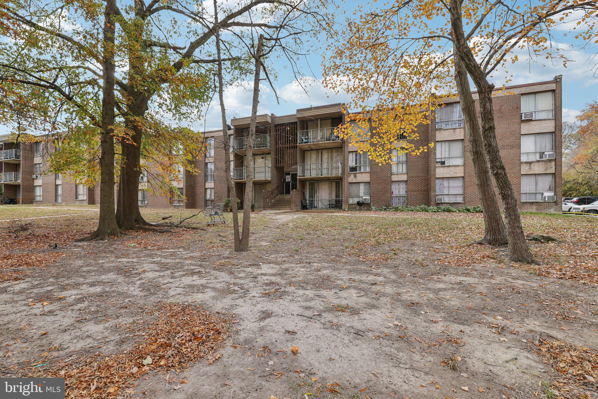 7969 Riggs Road, Unit 9 Hyattsville, MD 20783 - Photo 29 of 30 a view of a building with trees