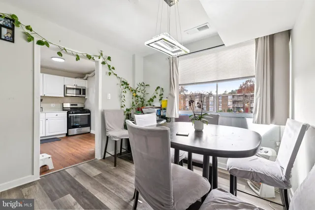 a view of a dining room with furniture