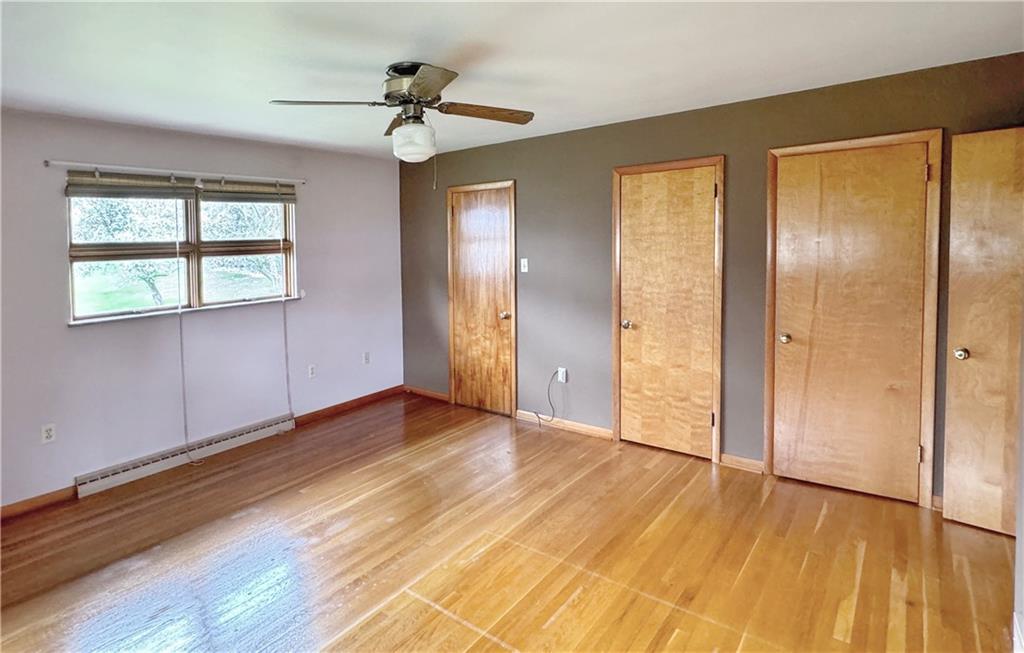 1215 Center Road Monaca, PA 15061 - Photo 16 of 33 wooden floor in an empty room with a window
