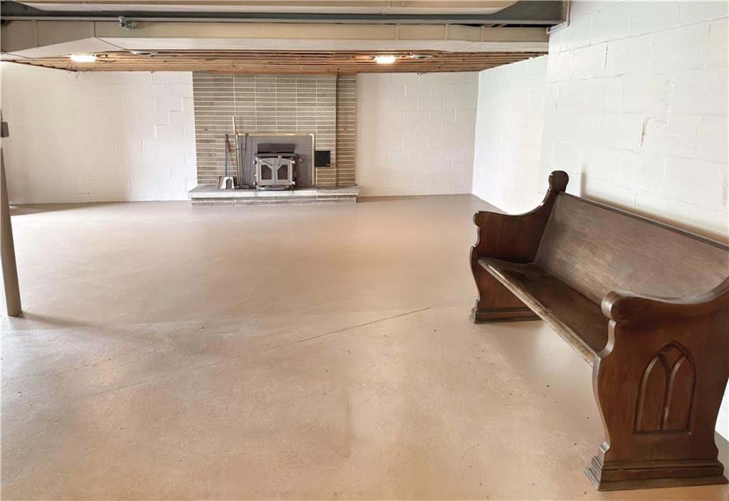 1215 Center Road Monaca, PA 15061 - Photo 26 of 33 a living room with furniture and a fireplace