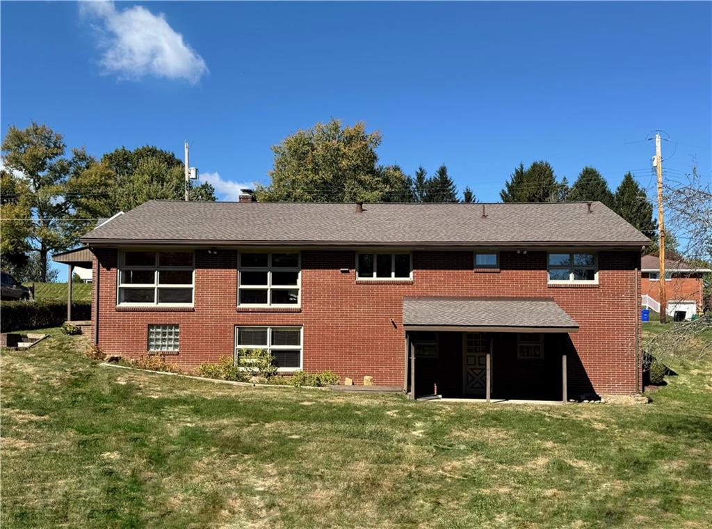 1215 Center Road Monaca, PA 15061 - Photo 33 of 33 a front view of a house with a yard