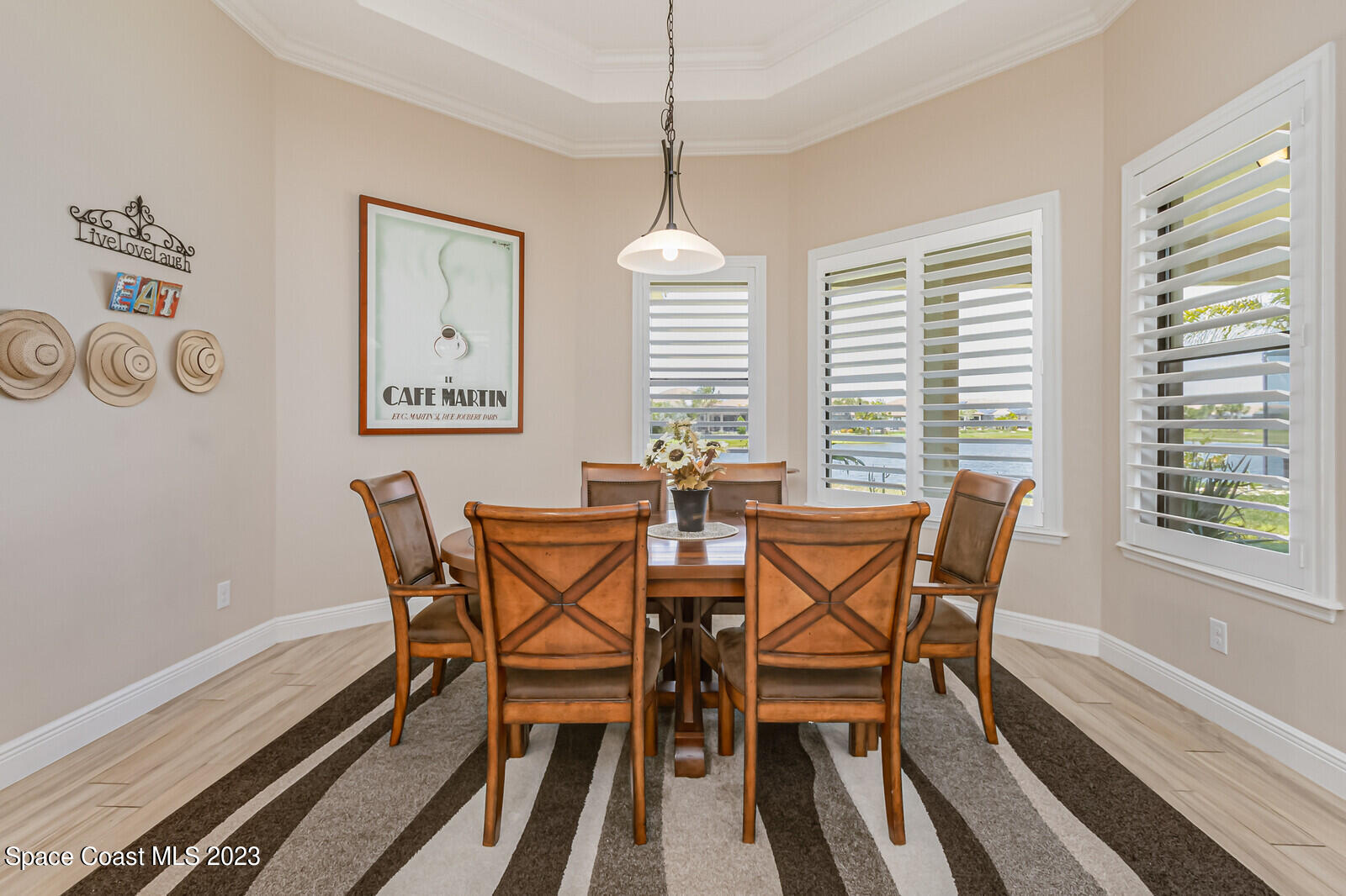 2928 Addison Drive Melbourne, FL 32940 - Photo 22 of 69 a dining room with furniture and window