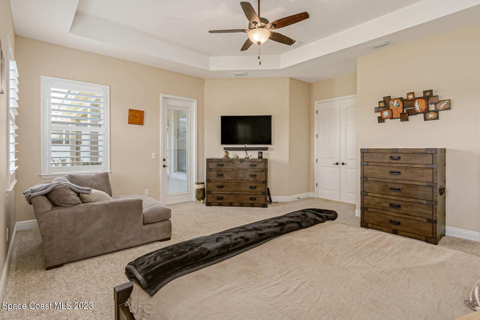 2928 Addison Drive Melbourne, FL 32940 - Photo 24 of 69 a bedroom with a bed and furniture